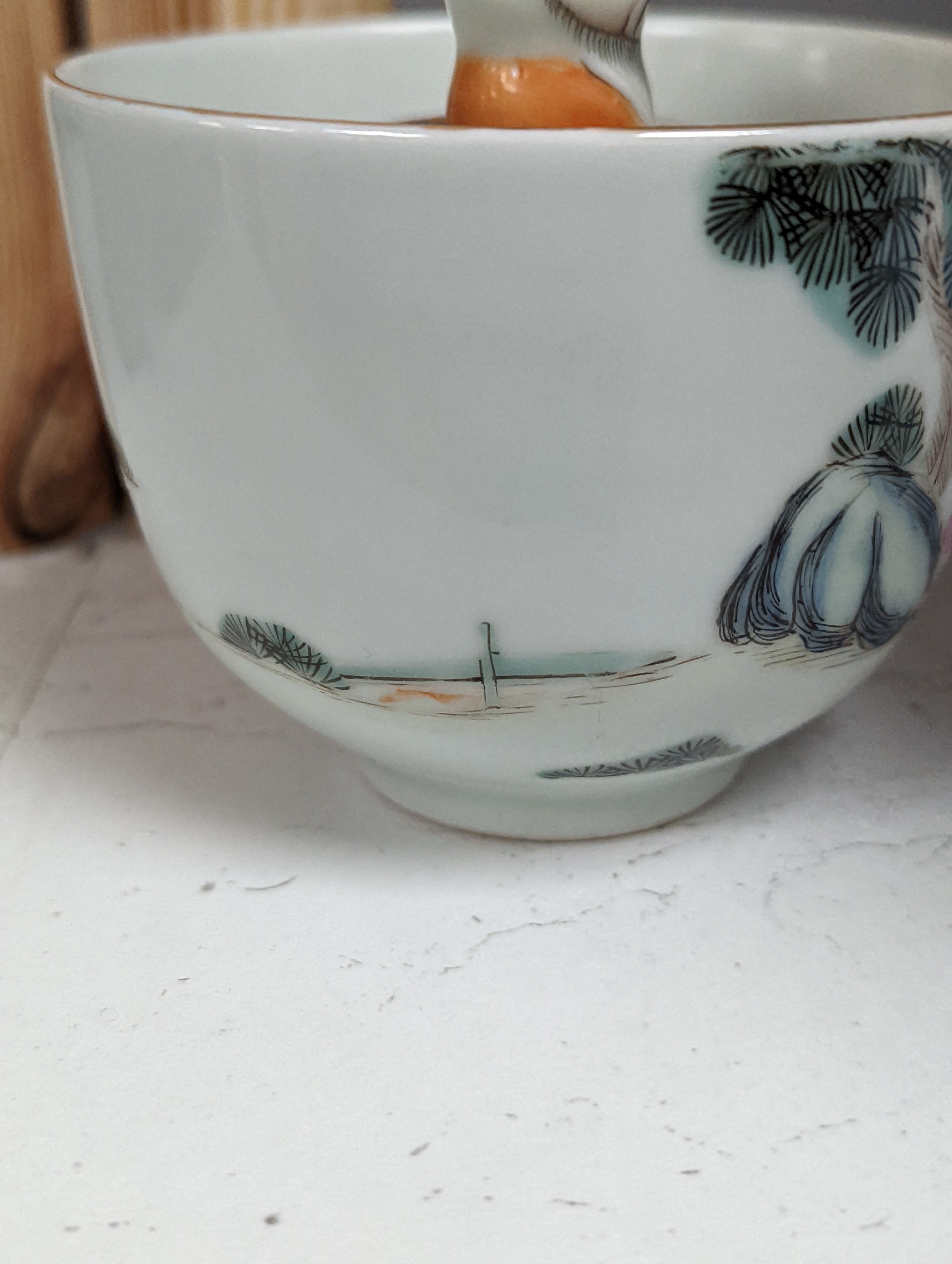 A Chinese famille rose puzzle cup, 8cm high